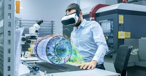 A technician uses a VR headset to interact with a digital twin, enhancing design, testing, and manufacturing efficiency.